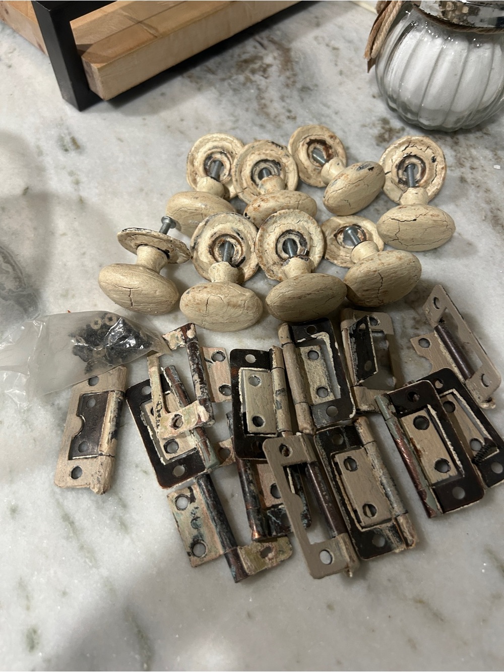 8 Vintage cream colored heavy metal knobs and 13 hinges